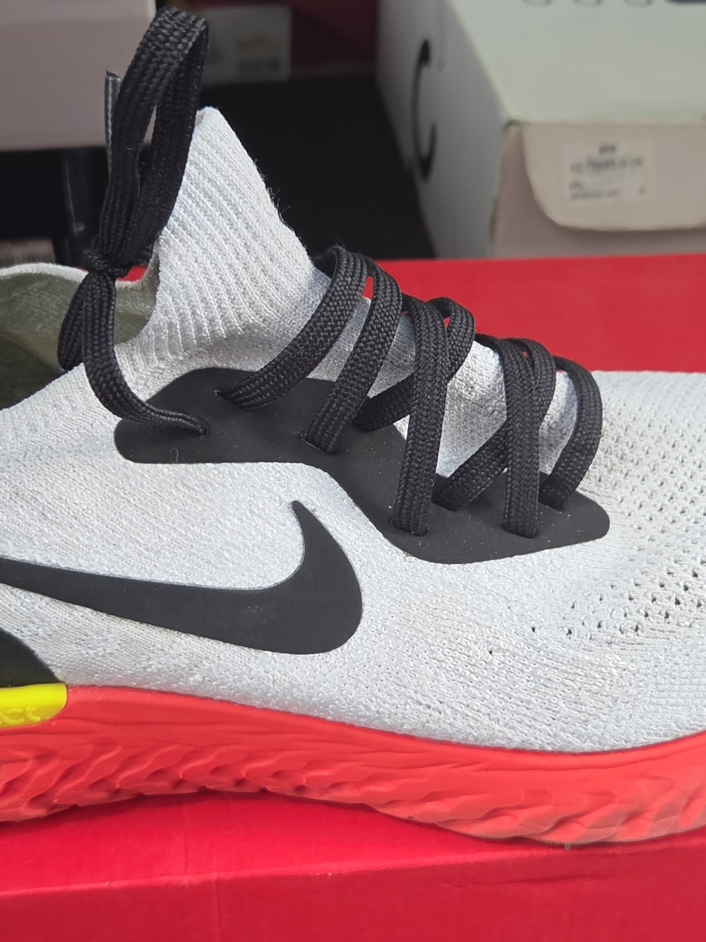 Nike White Knit Running Shoes with Black & Red Accents - Picture 2 of 3
